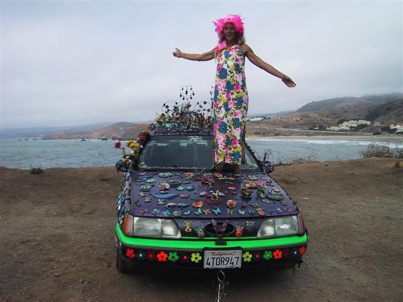 Illustration for article titled Groovalicious Purple Princess Of Peace Art Car Falls On Hard Times, Faces Crusher
